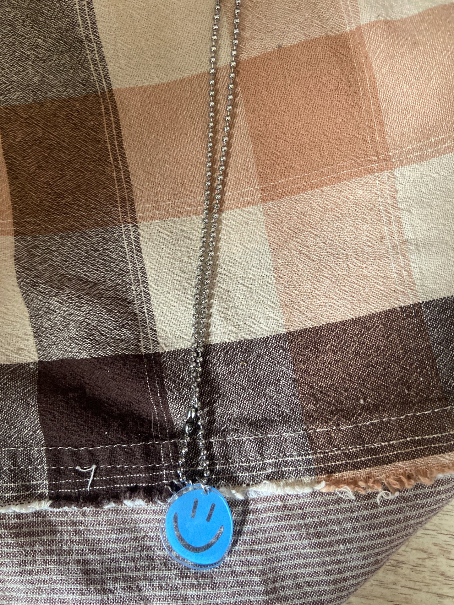 BLUE SMILEY FACE NECKLEACE