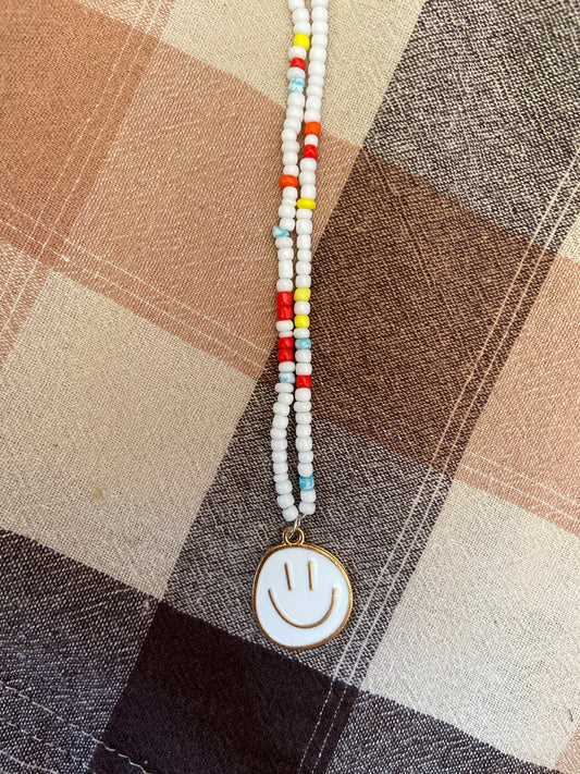 WHITE SMILEY FACE NECKLEAEC