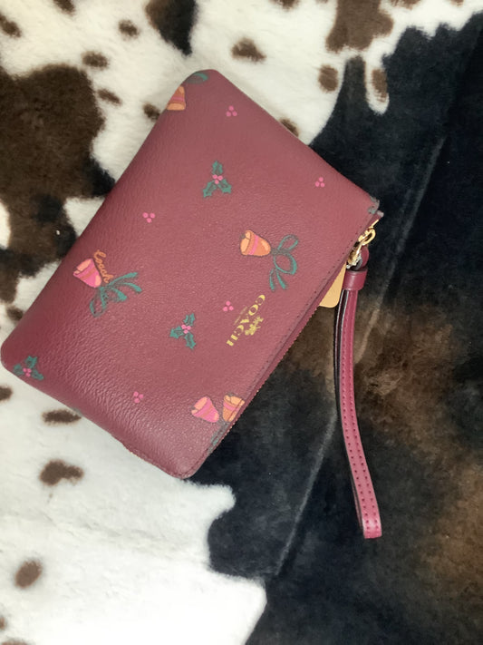 COACH CORNER ZIP WRISTLET WITH HOLIDAY BELLS
